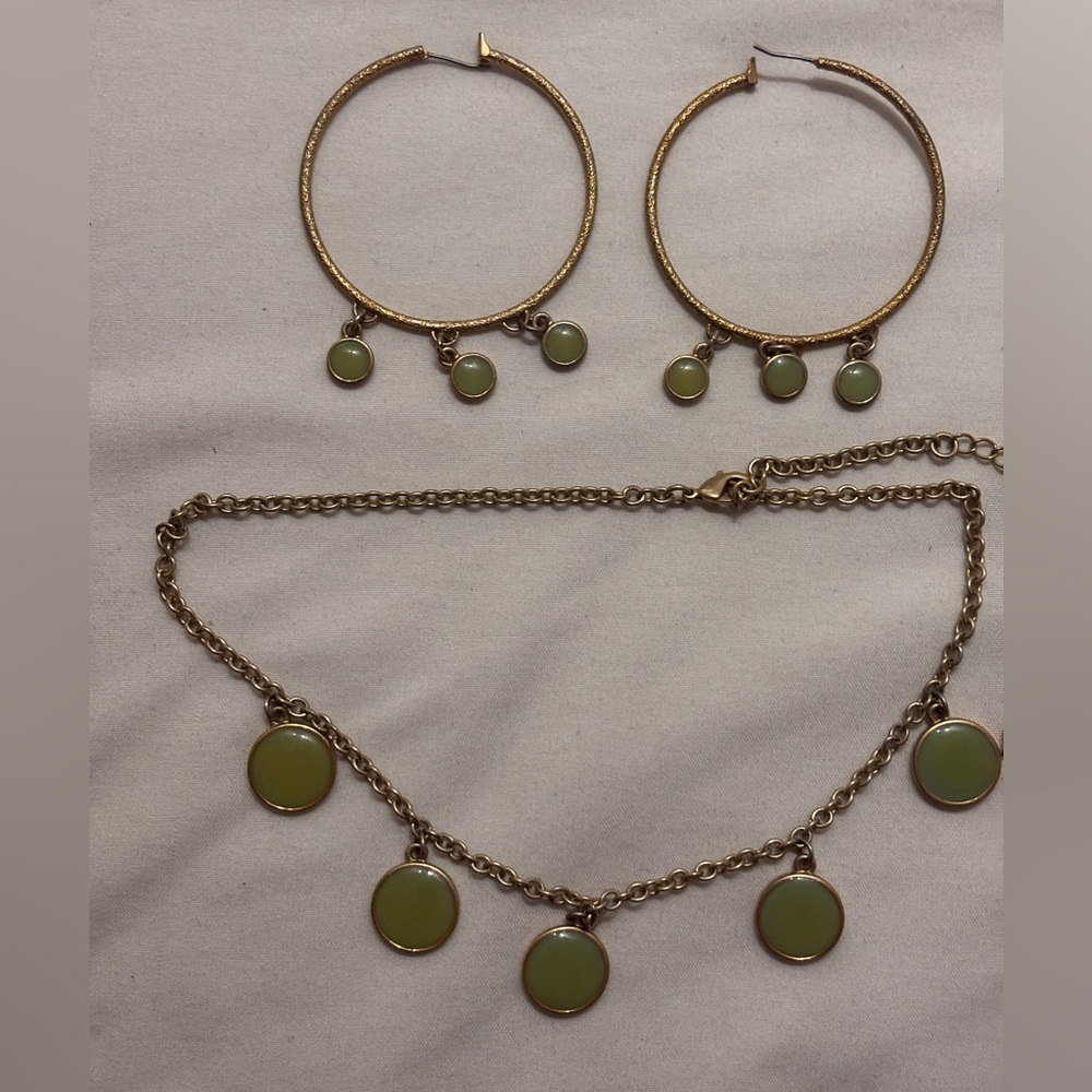 Matching green stone jewelry set featuring hoop earrings and a choker